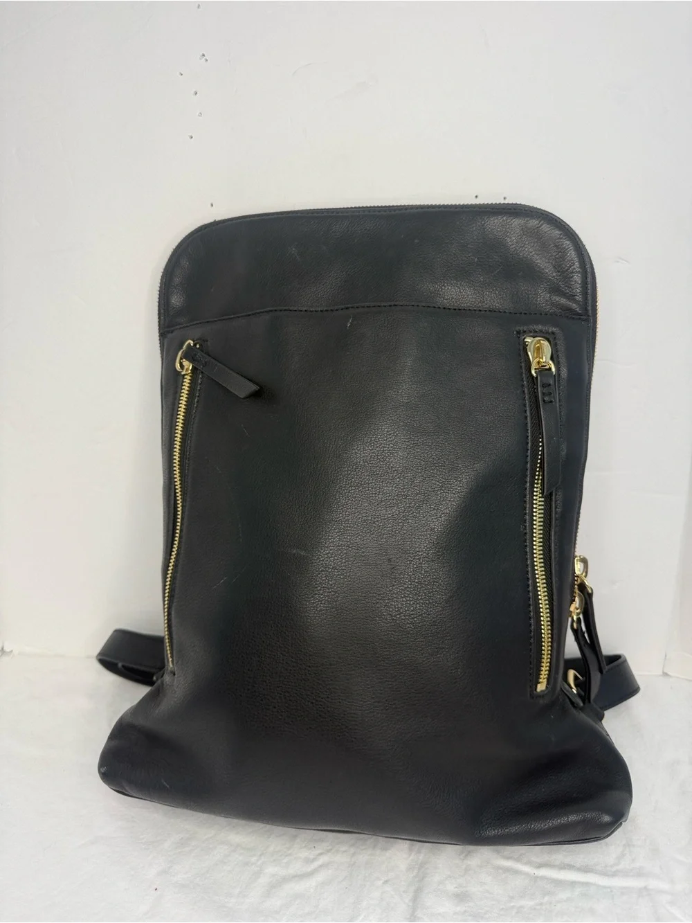 Black Leather Men’s Backpack with Gold Hardware